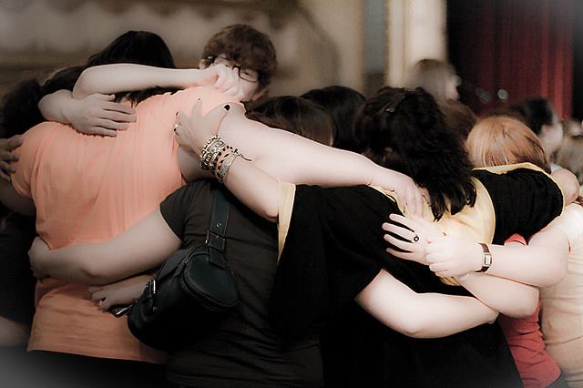 Group of teens working out their friendship