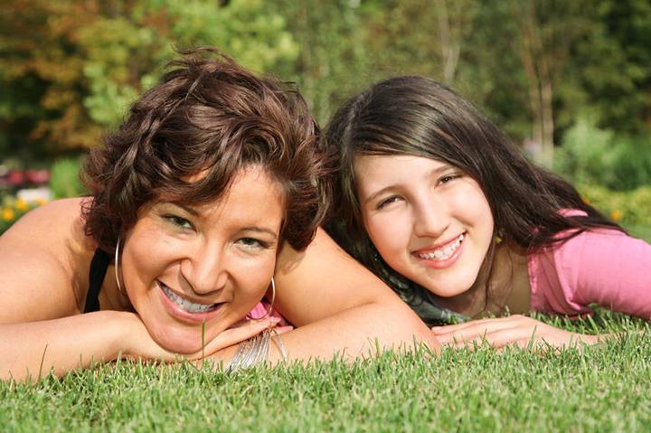 Mother bonding with teen showing importance of role of the parent